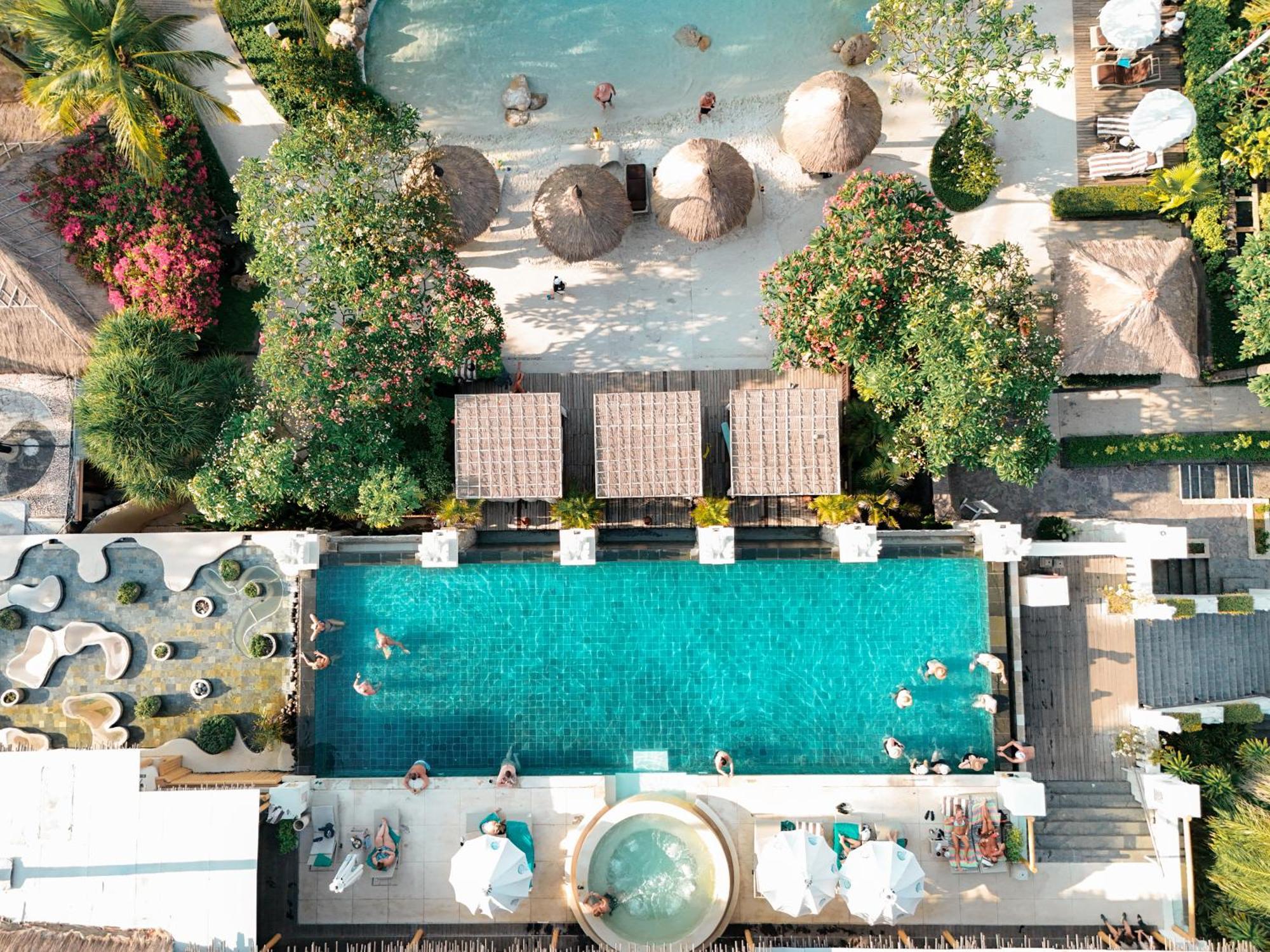 Bali Mandira Beach Resort & Spa Legian Exterior foto Aerial view of the pool at the hotel